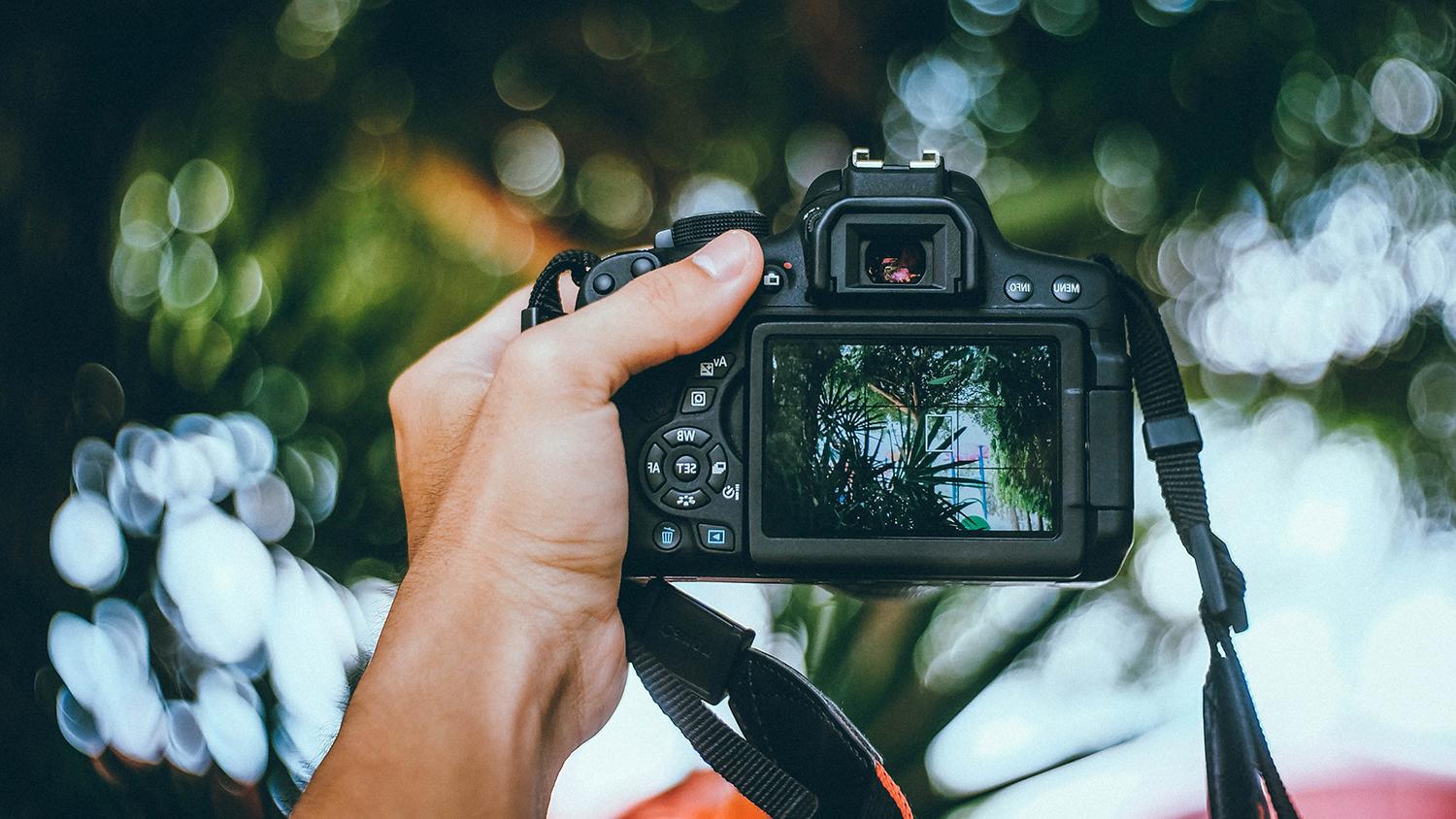 Woman taking a picture of herself.